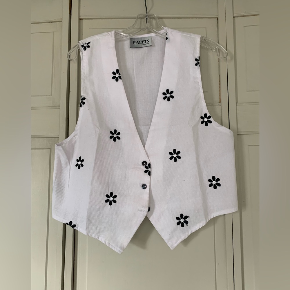 Facets by Mirror vest.